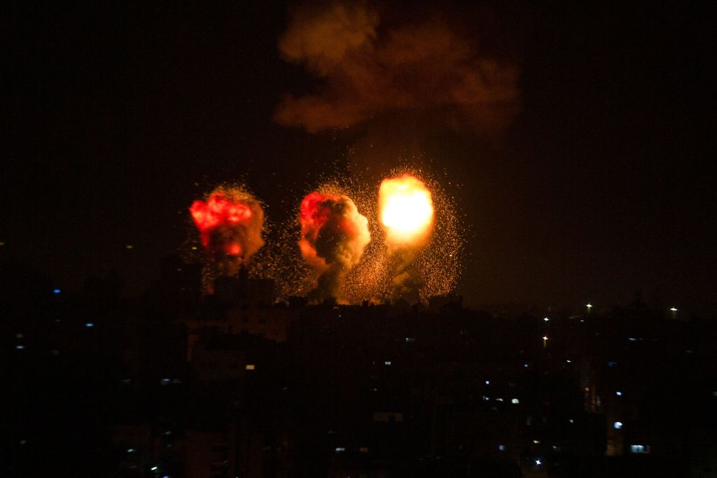 من الغارات الإسرائيلية على قطاع غزة فجر الأحد - Getty