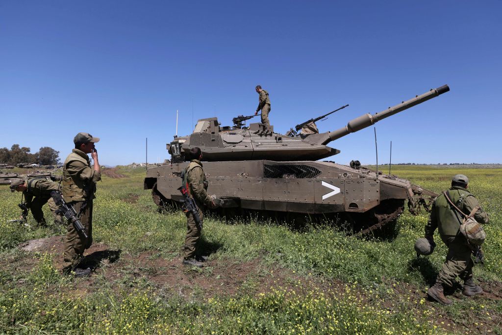 دبابة إسرائيلية في مرتفعات الجولان السوري المحتل -  JALAA MAREY/ Getty Images 