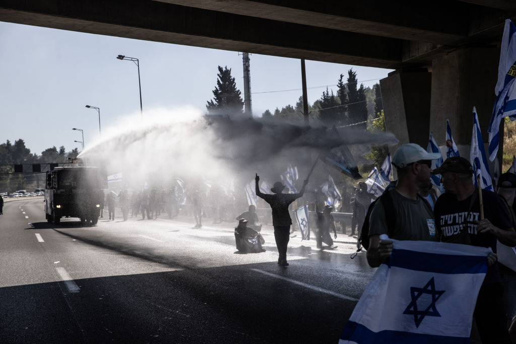 الشرطة الإسرائيلية تقمع متظاهرين رافضين للتعديلات القضائية - Mostafa Alkharouf/Getty Images