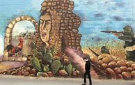 لوحة "هُنا كنعان" رسمها 25 فنّانًا على جدار في نابلس 2013
