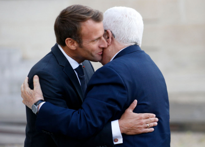 خلال لقاء سابق بين عباس وماكرون في باريس 2018 - Chesnot/Getty