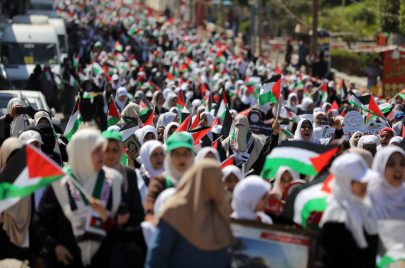 مسيرة لفتيات حافظات للقرآن الكريم في مدينة غزة Majdi Fathi/Getty