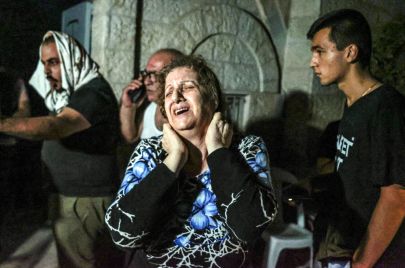 من القصف الإسرائيلي لكنيسة بوفيليوس في مدينة غزة - Ali Jadallah/ Getty Images