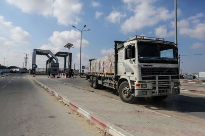 صورة لشاحنات المساعدات عبر معبر رفح. تصوير أحمد حسب الله