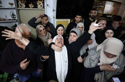 والدة أحد شهداء مخيم طولكرم بالضفة الغربية، الأربعاء -  ZAIN JAAFAR/AFP via Getty Images