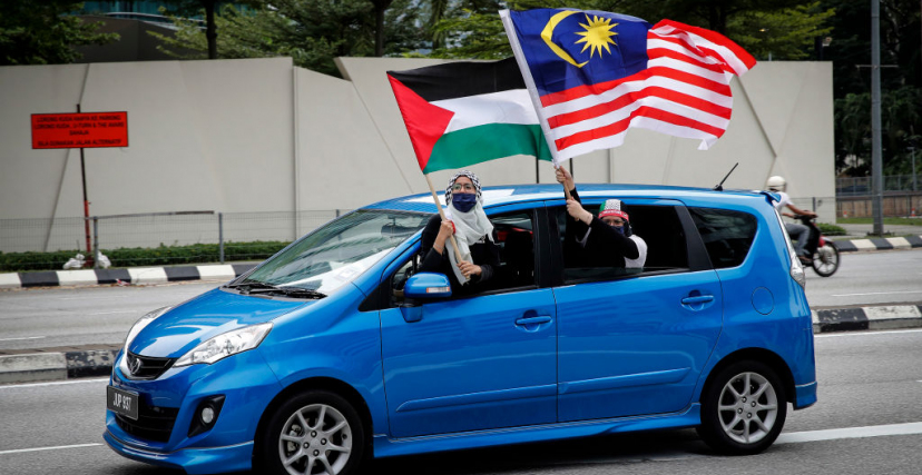  ماليزيون مؤيّدون للقضية الفلسطينية في تظاهرة في كوالالمبور - Wong Fok Loy/ Getty