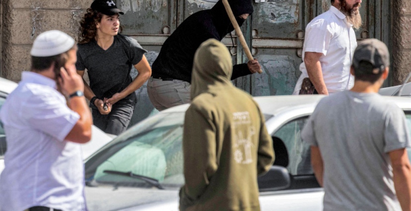 مستوطنون ينفذون اعتداءات على الفلسطينيين في حوارة جنوب نابلس (OREN ZIV/ Getty Images)
