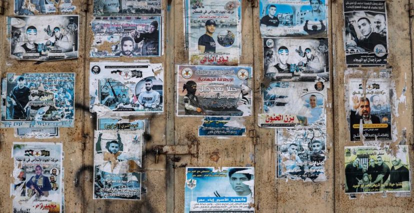 ملصقات لشهداء في مخيم جنين -  JAAFAR ASHTIYEH/ Getty Images